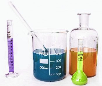 dissolving chemicals in solvent in a laboratory